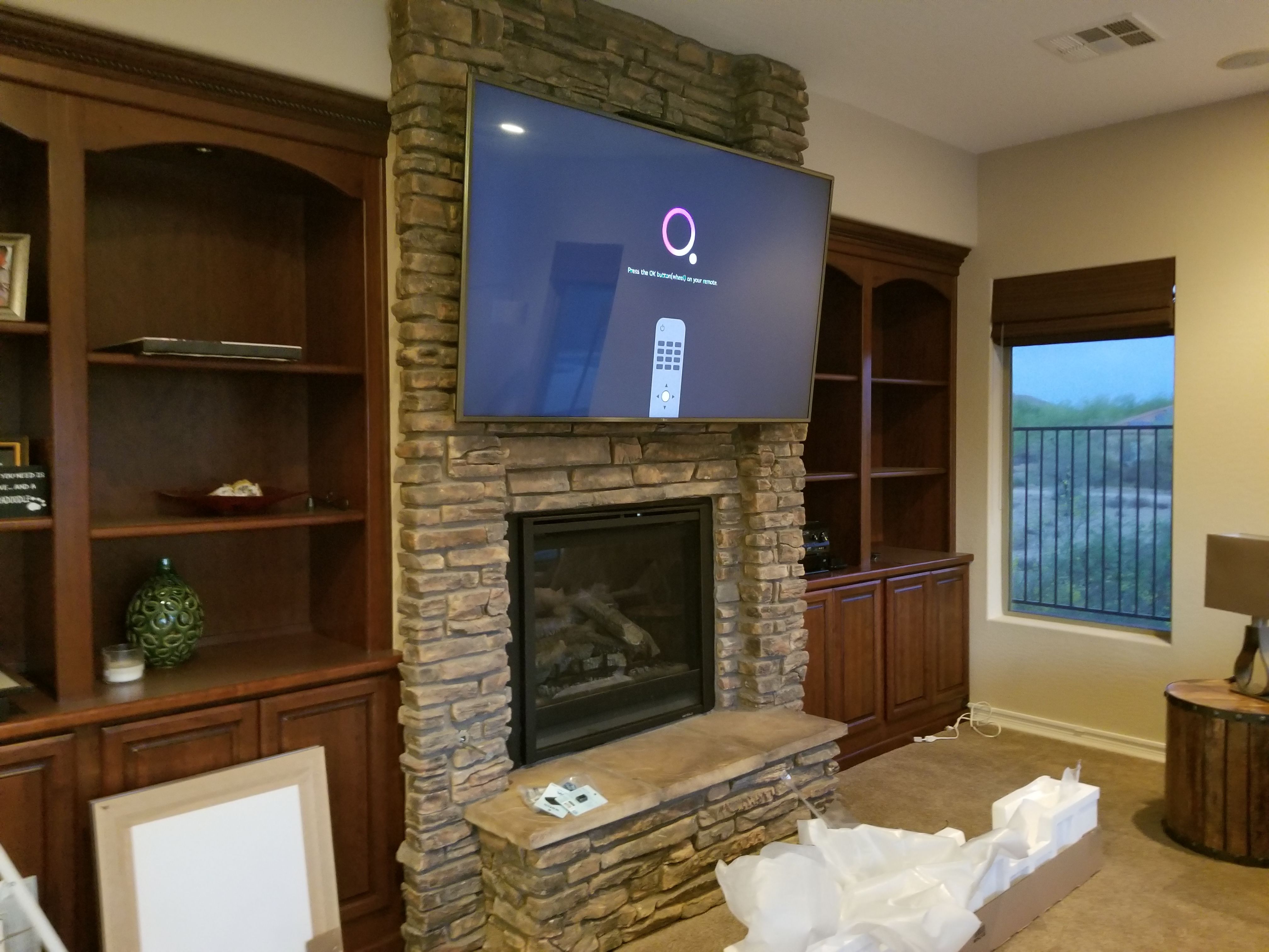 Fireplace mounted TV